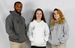 three students wearing sweatshirts in gray, white, and dark gray. all say montclair state university campus recreation surrounding the red hawk logo in black