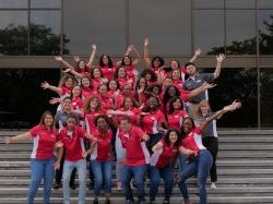 The Orientation Leaders posing for a photo on the front steps of the Student Center