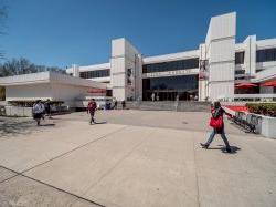 Front of the Student Center with student walking.